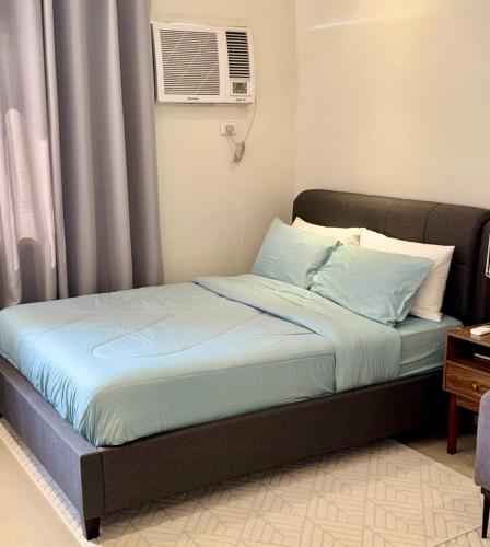 Postel nebo postele na pokoji v ubytování Studio type condo - Matina Enclaves Residences Davao City