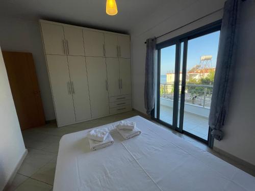 Postel nebo postele na pokoji v ubytování Tasos Rooms