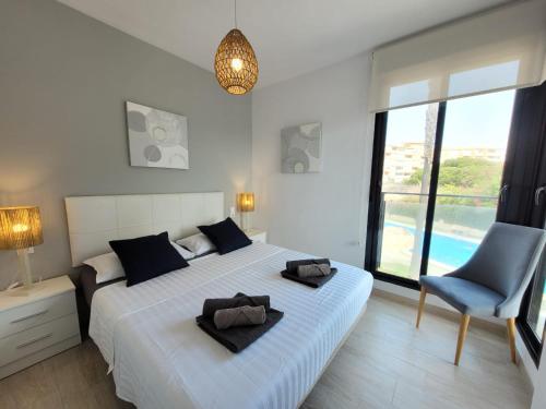 Postel nebo postele na pokoji v ubytování Pinada Beach 315