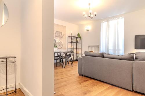 a living room with a couch and a table at Blue Como Luxury Apt#3 in Como