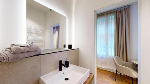 Ένα ή περισσότερα κρεβάτια σε δωμάτιο στο Apartment 01 No 8A BoardingHouse Lüneburg