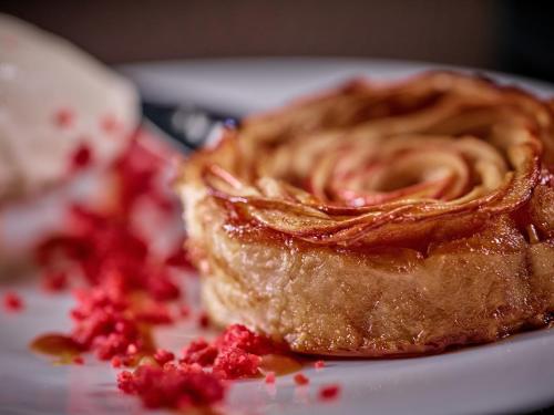 a piece of pie sitting on a white plate at Hotel Europe in Zinal