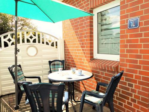 Patio nebo venkovní prostory v ubytování " HAUS ROSI " - Reihenhaus 2 - Strandnah - Ruhig - WLAN - Parkplatz - Grillplatz -Waschmaschine -