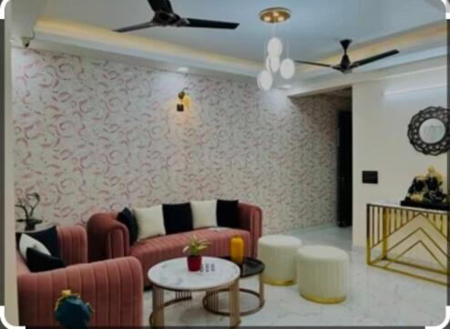 Zona de estar de The Golden Gate 2BHK Fully Airconditioned Flat