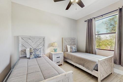 Katil atau katil-katil dalam bilik di Sunny Pines Retreat