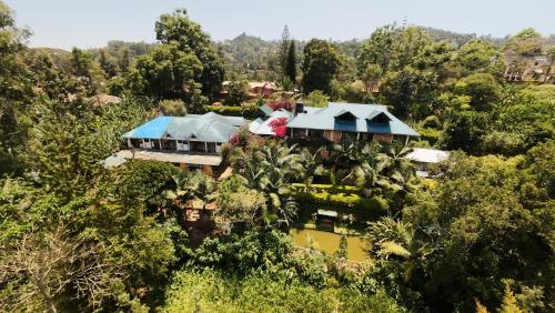 an overhead view of a house in the forest at Kakakuona Resort in Lushoto