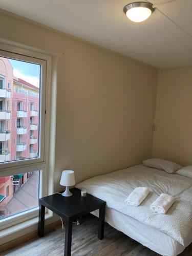 Postel nebo postele na pokoji v ubytování Guesthouse Centrum