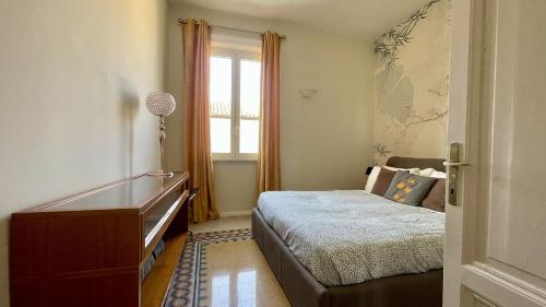 A bed or beds in a room at Santonofrio SKY Terrace Penthouse