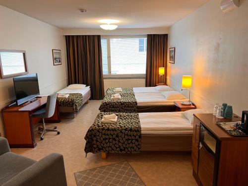 Postel nebo postele na pokoji v ubytování Budget Hotel Easystay
