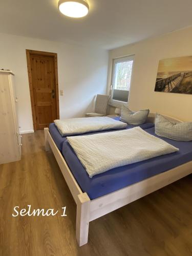 Postel nebo postele na pokoji v ubytování Haus Selma