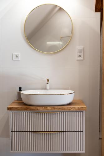 Ένα μπάνιο στο Apartament Pod Bukowym Lasem