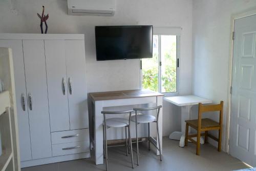 TV a/nebo společenská místnost v ubytování Suites Atlantis