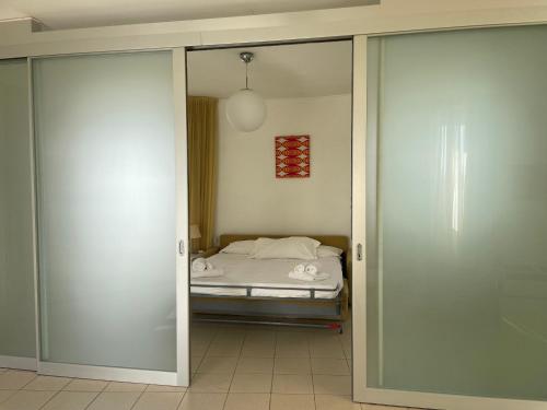 Postel nebo postele na pokoji v ubytování Solidago Residence