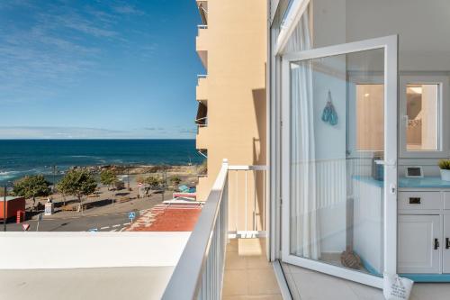 a balcony with a view of the ocean at Atlantic Sunsets By Agüita Salada in Bajamar