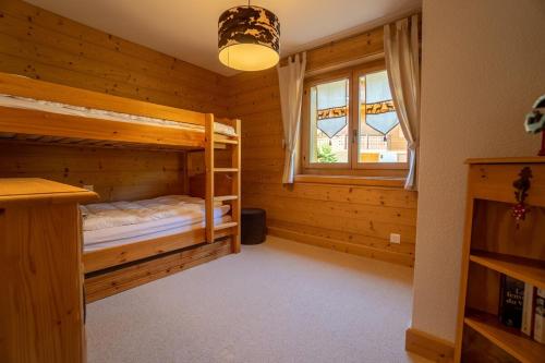Postel nebo postele na pokoji v ubytování Salomon 02 in Gryon - bright, spacious and superb 4-room
