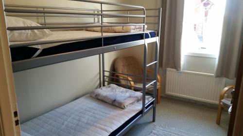 Säng eller sängar i ett rum på Strandterrassen Hostel