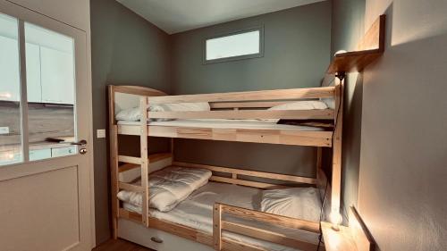 En eller flere senge i et værelse på L'ensoleillé, T2 face océan