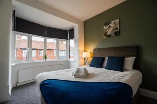 En eller flere senge i et værelse på Buckingham House Horizon Stays