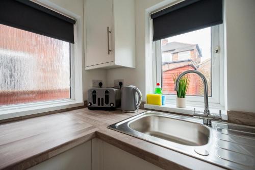 Køkken eller tekøkken på Buckingham House Horizon Stays