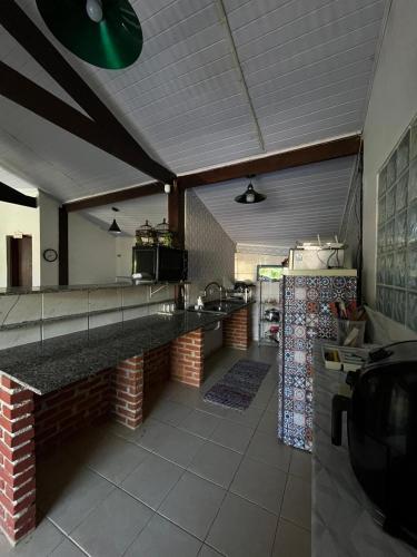 a kitchen with a counter top at Solaris do Una in São Sebastião