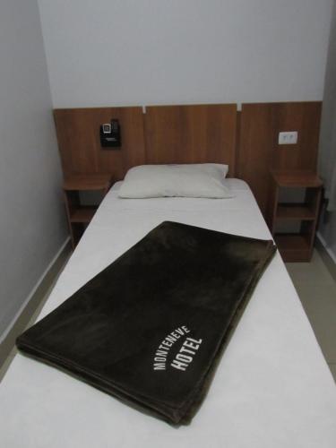 Una cama o camas en una habitación de Hotel Monteneve
