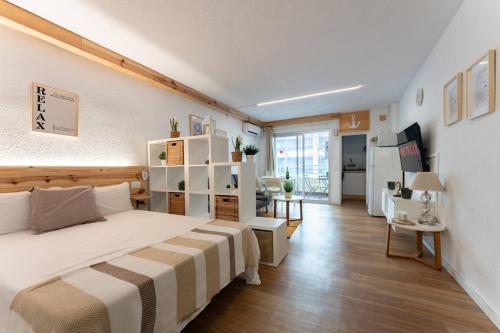 En eller flere senge i et værelse på Acogedor estudio en Salou