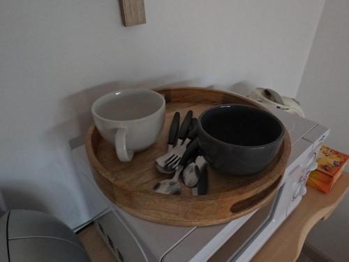 Kemudahan buat kopi dan teh di chambre 2 personnes Pinet