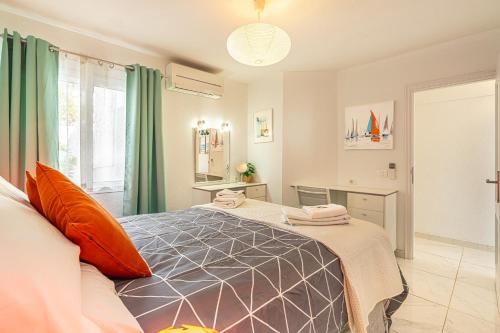 a bedroom with a bed with two towels on it at Ocean View La Caleta in Adeje