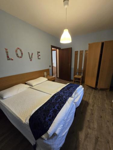 Postel nebo postele na pokoji v ubytování Casa Ornella