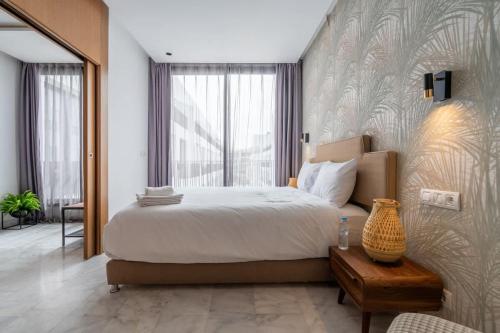 Ένα ή περισσότερα κρεβάτια σε δωμάτιο στο Studio Raffiné en Centre Ville