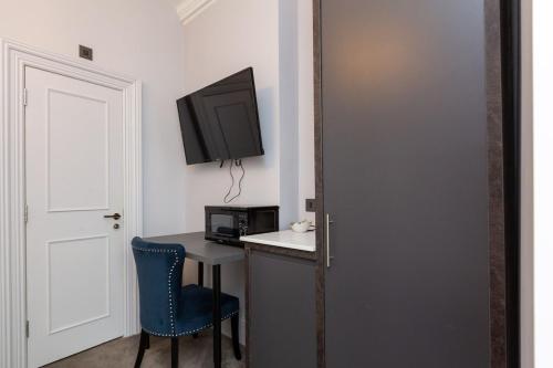 Μια τηλεόραση ή/και κέντρο ψυχαγωγίας στο Superb Seafront Studio