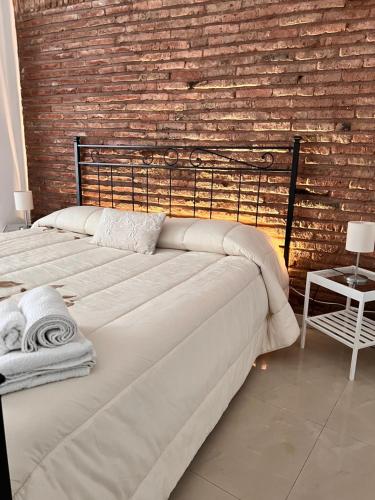 A bed or beds in a room at Tania's House