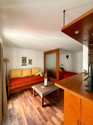 a living room with a couch and a table at Departamento San Bernardo - Céntrico Salta in Salta