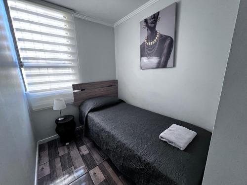 Кровать или кровати в номере CÓMODO Y RENOVADO DEPARTAMENTO CON VISTA AL MAR