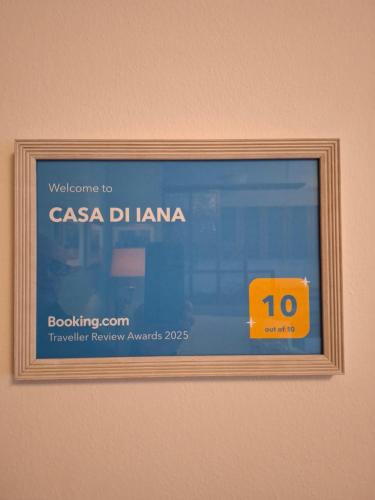 a picture of a sign in a frame on a wall at CASA DI IANA in Mestre