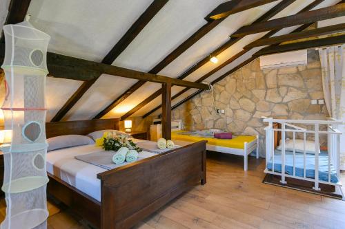 Posteľ alebo postele v izbe v ubytovaní Apartments Villa ViDa Orebić