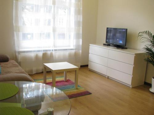 TV a/nebo společenská místnost v ubytování Villa Sart
