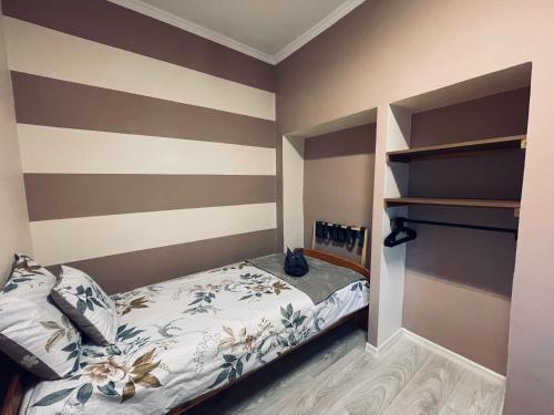 Katil atau katil-katil dalam bilik di Royal Gold Apartman