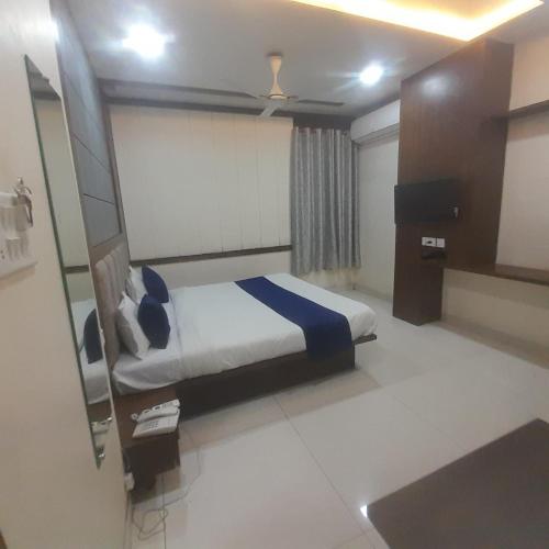 Postel nebo postele na pokoji v ubytování Hotel Coral