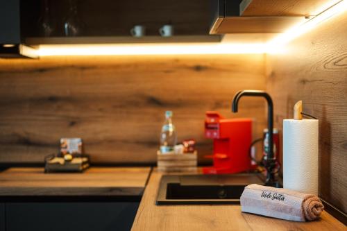 Η κουζίνα ή μικρή κουζίνα στο Уютно студио Verde Suites 14