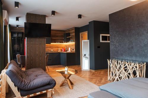 Η κουζίνα ή μικρή κουζίνα στο Уютно студио Verde Suites 14