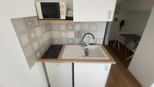 Kuchyň nebo kuchyňský kout v ubytování Studio N210 cozy et fonctionnel