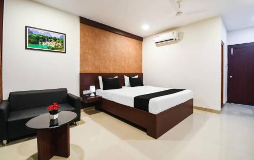 Krevet ili kreveti u jedinici u okviru objekta Hotel Shiv shakti residency