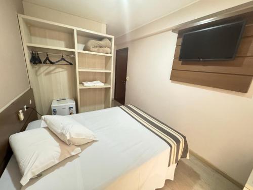 Postel nebo postele na pokoji v ubytování Hotel Sol By MRHotelaria