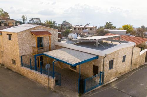 a house being constructed on a street at The Hideaway Suite, Cozy Courtyard Retreat in the Hills in Peristerona