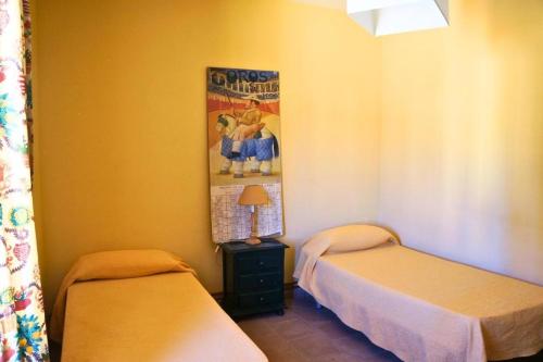 Katil atau katil-katil dalam bilik di Casa Palacio de Guadix