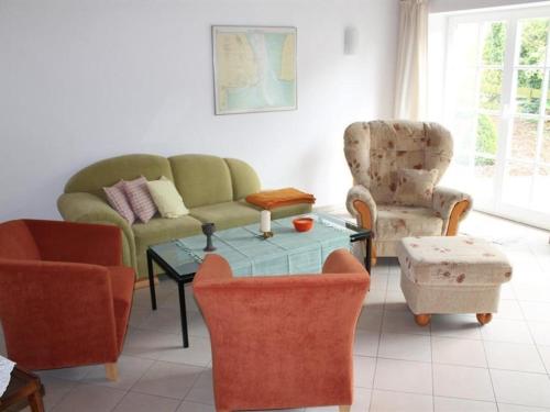 Posezení v ubytování Ferienhaus 258 S in Eckwarden