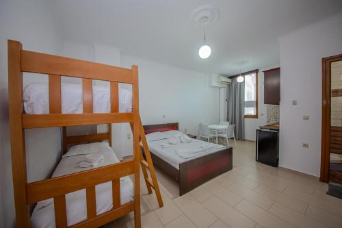 Postel nebo postele na pokoji v ubytování Hotel Landi