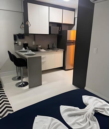 Dapur atau dapur kecil di Apartamento no 9º Andar com Vista Privilegiada para o Mar