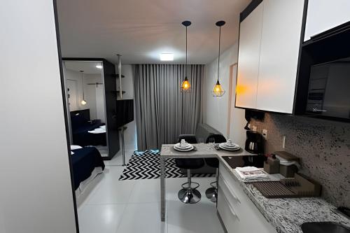 Dapur atau dapur kecil di Apartamento no 9º Andar com Vista Privilegiada para o Mar